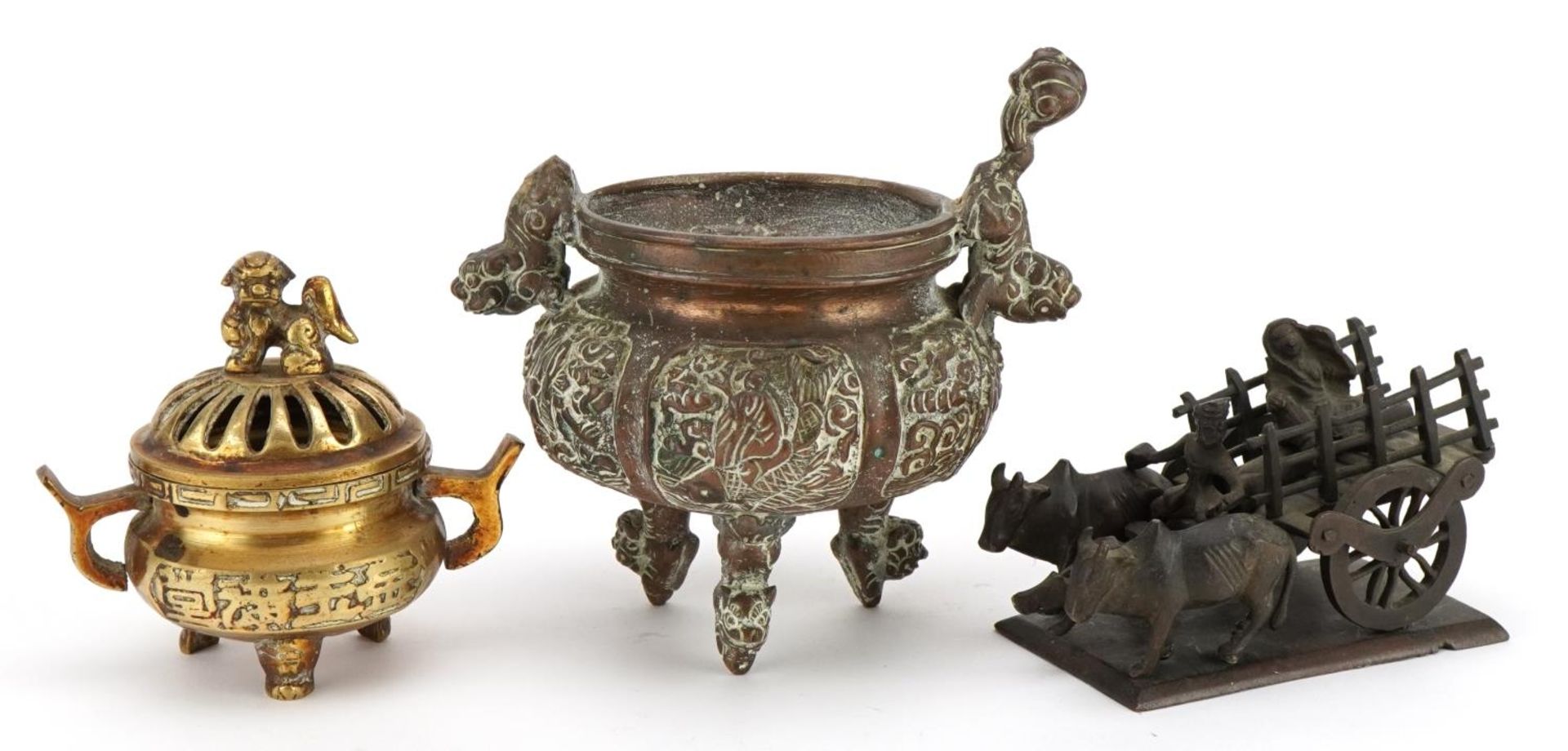 Two Chinese bronze censers and a bronze study of cattle pulling a cart, the largest 15cm wide