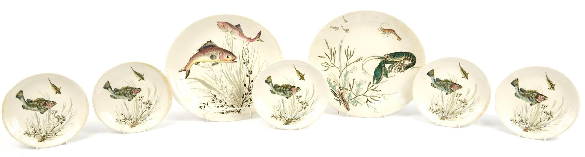 Seven Johnson Bros fish design plates, the largest each 26cm wide