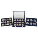 Collection of commemorative proof coins arranged in a fitted case including Diamond Jubilee,