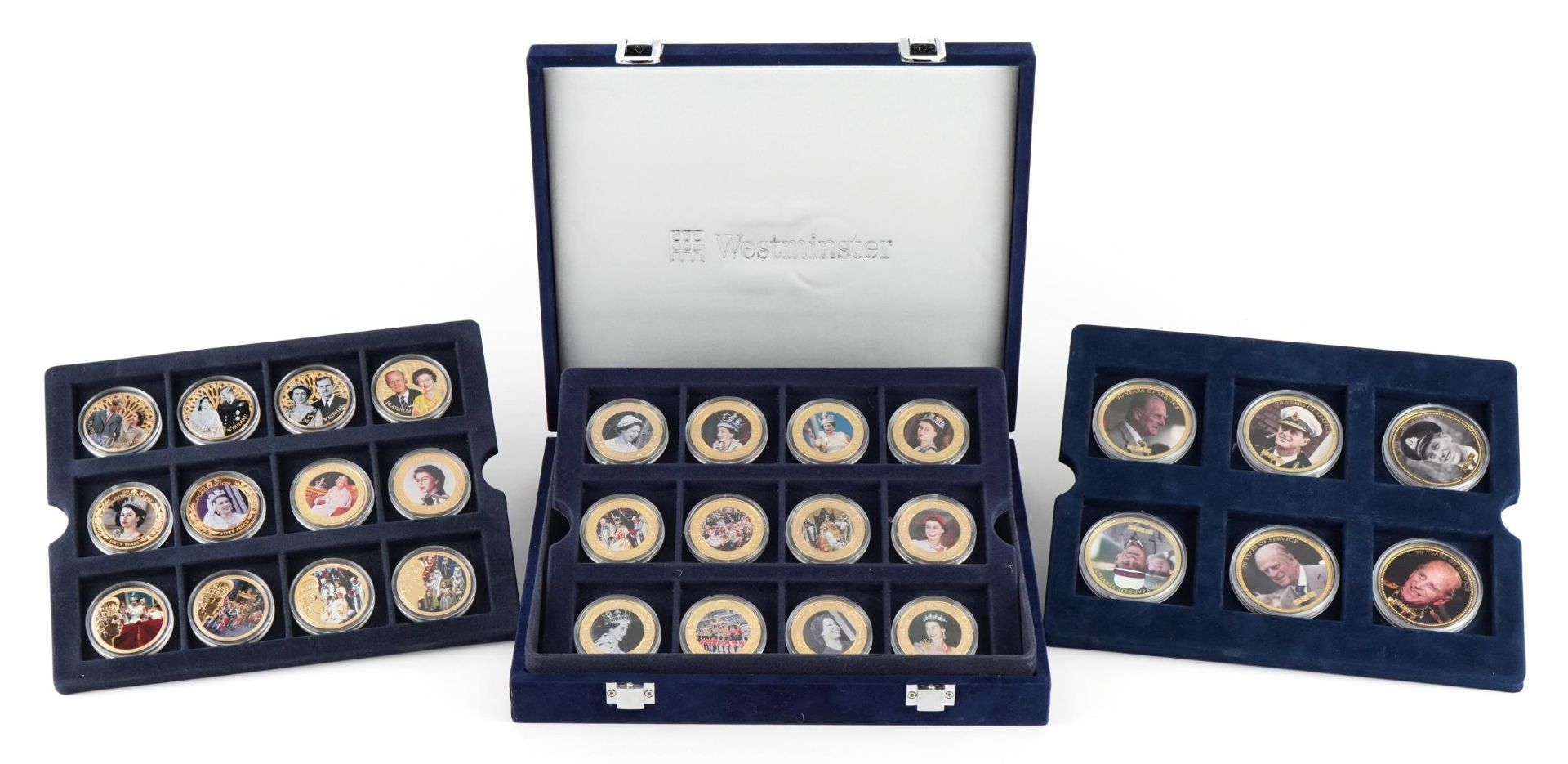 Collection of commemorative proof coins arranged in a fitted case including Diamond Jubilee,