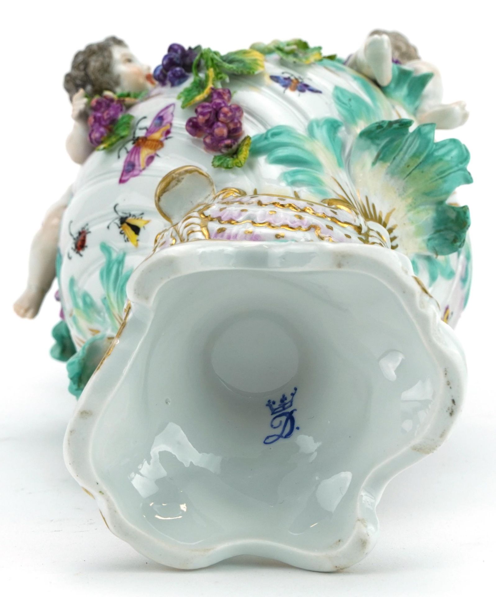 Manner of Dresden, continental porcelain floral encrusted ewer surmounted with two Putti, - Image 3 of 3