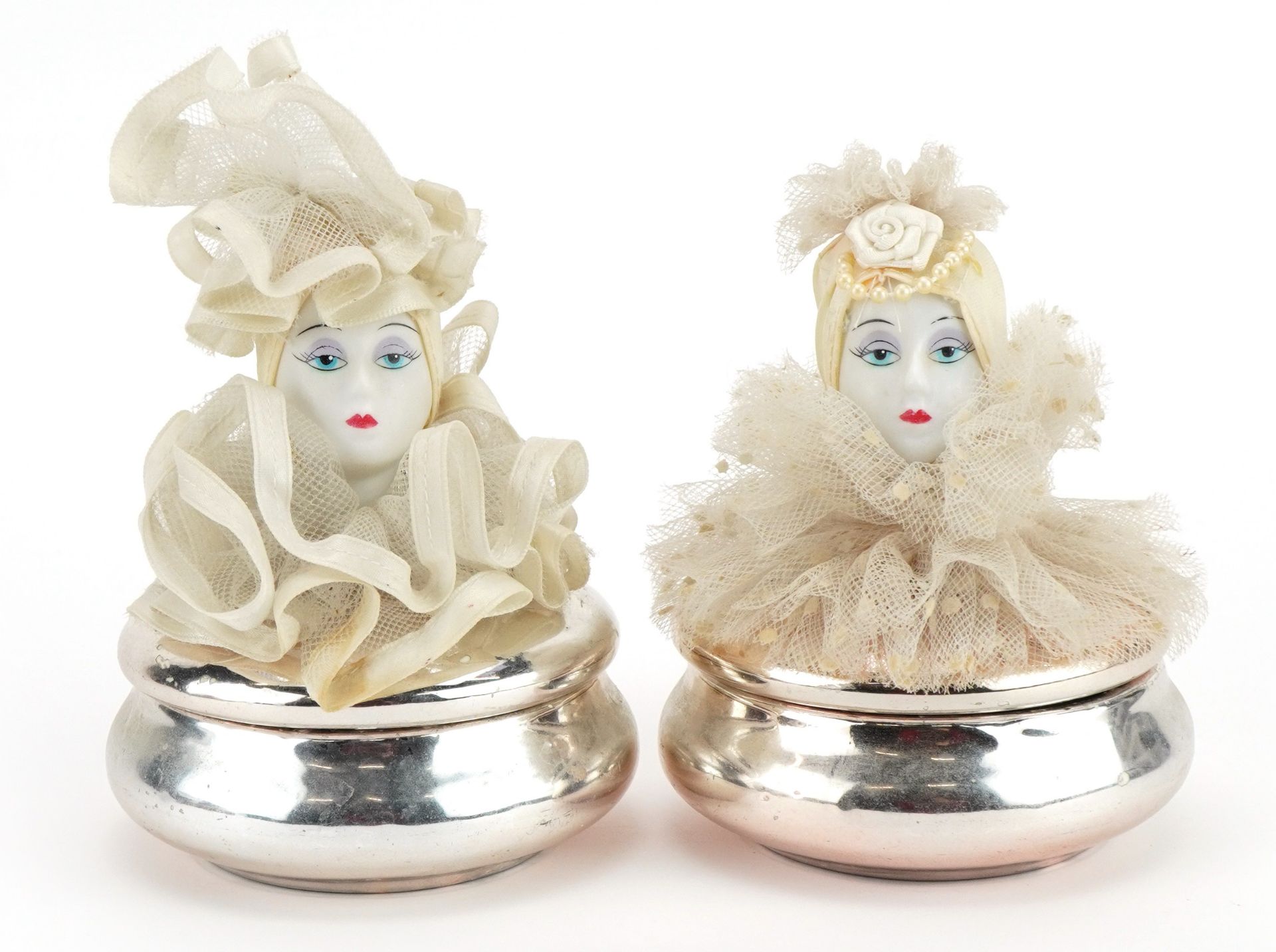 Two vintage Pierrot silver lustre china powder pots and covers with lace frills and hats, 12cm high