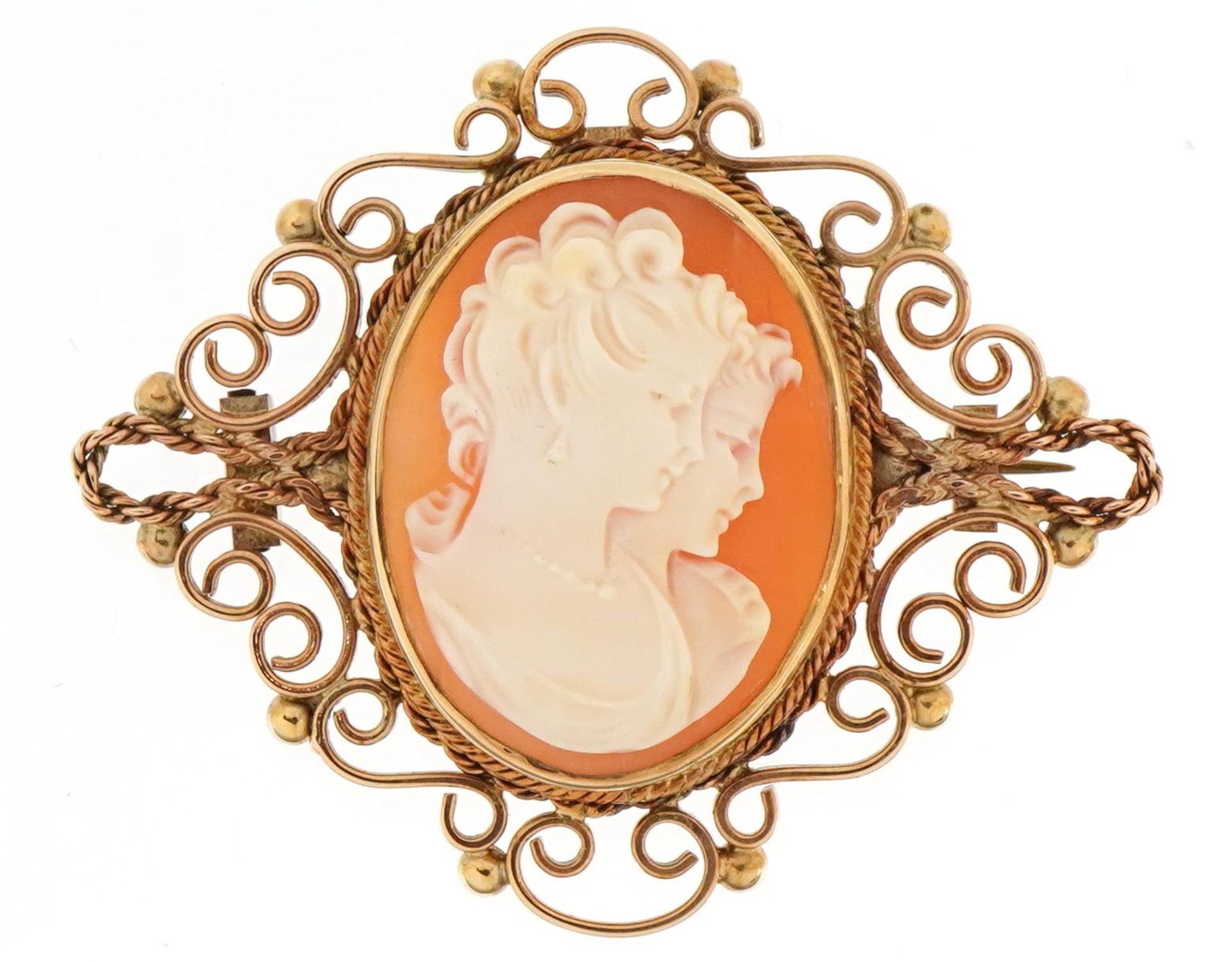 9ct gold mounted cameo brooch with yellow metal safety chain and carved with two females, 5.4cm