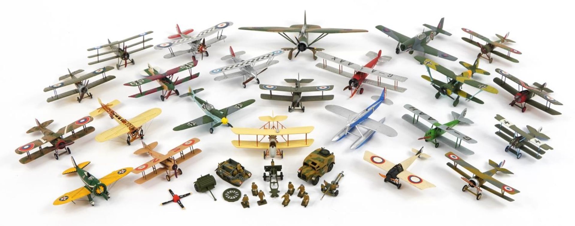 Collection of hand painted military interest aeroplanes and vehicles, the largest 16cm wide