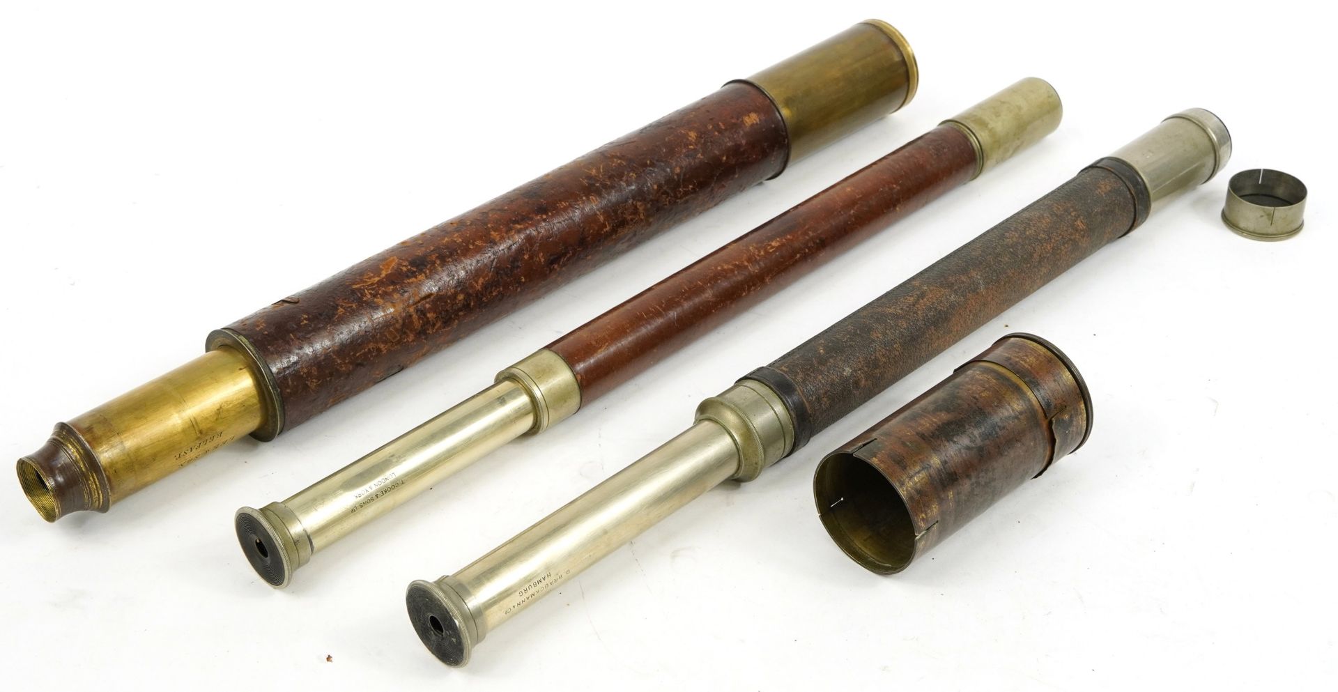 Three 19th century and later leather bound single draw telescopes comprising Lee & Son of Belfast, T - Image 2 of 5