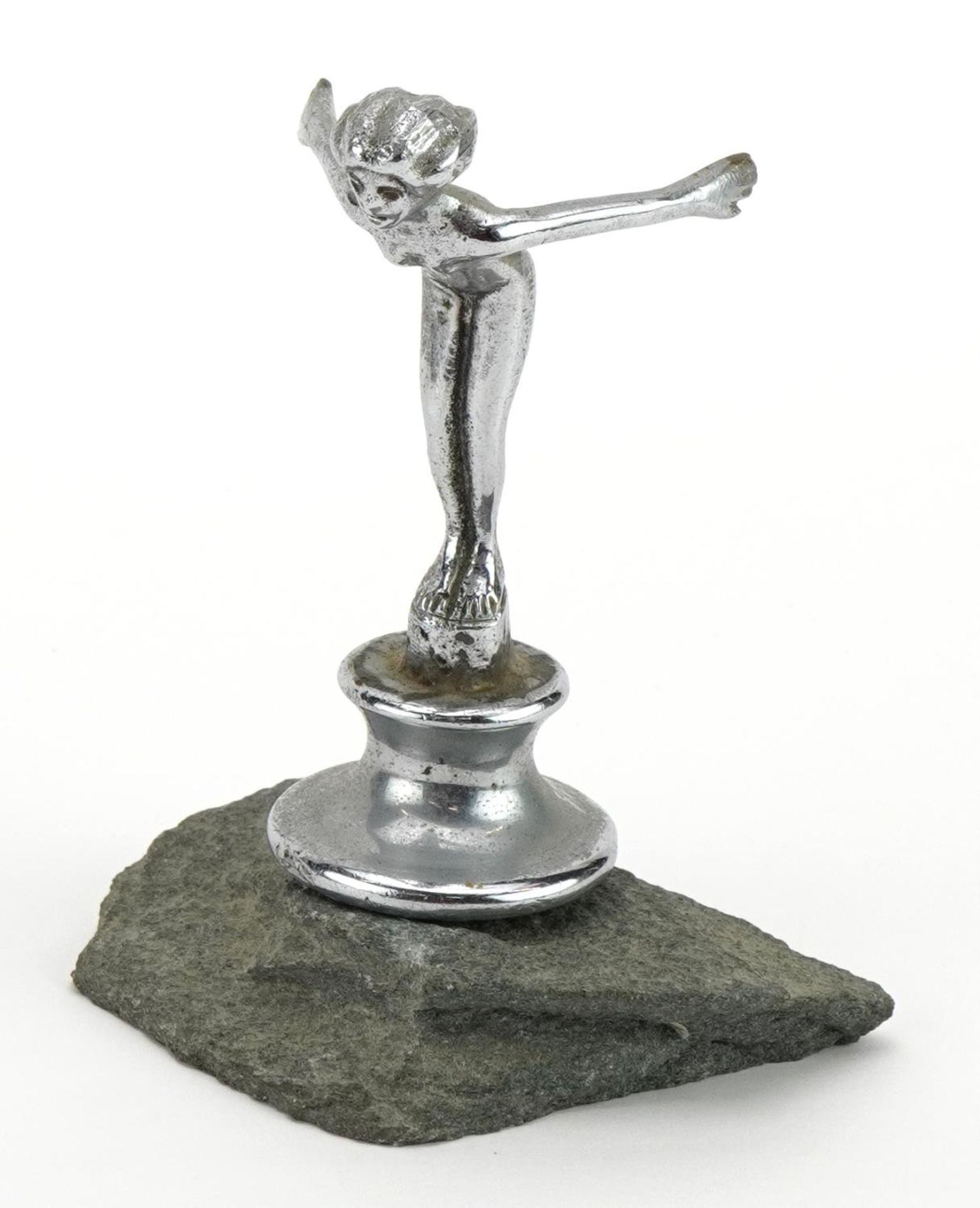 Early 20th century chrome Speed Nymph car mascot raised on a green slate stand, overall 11cm high