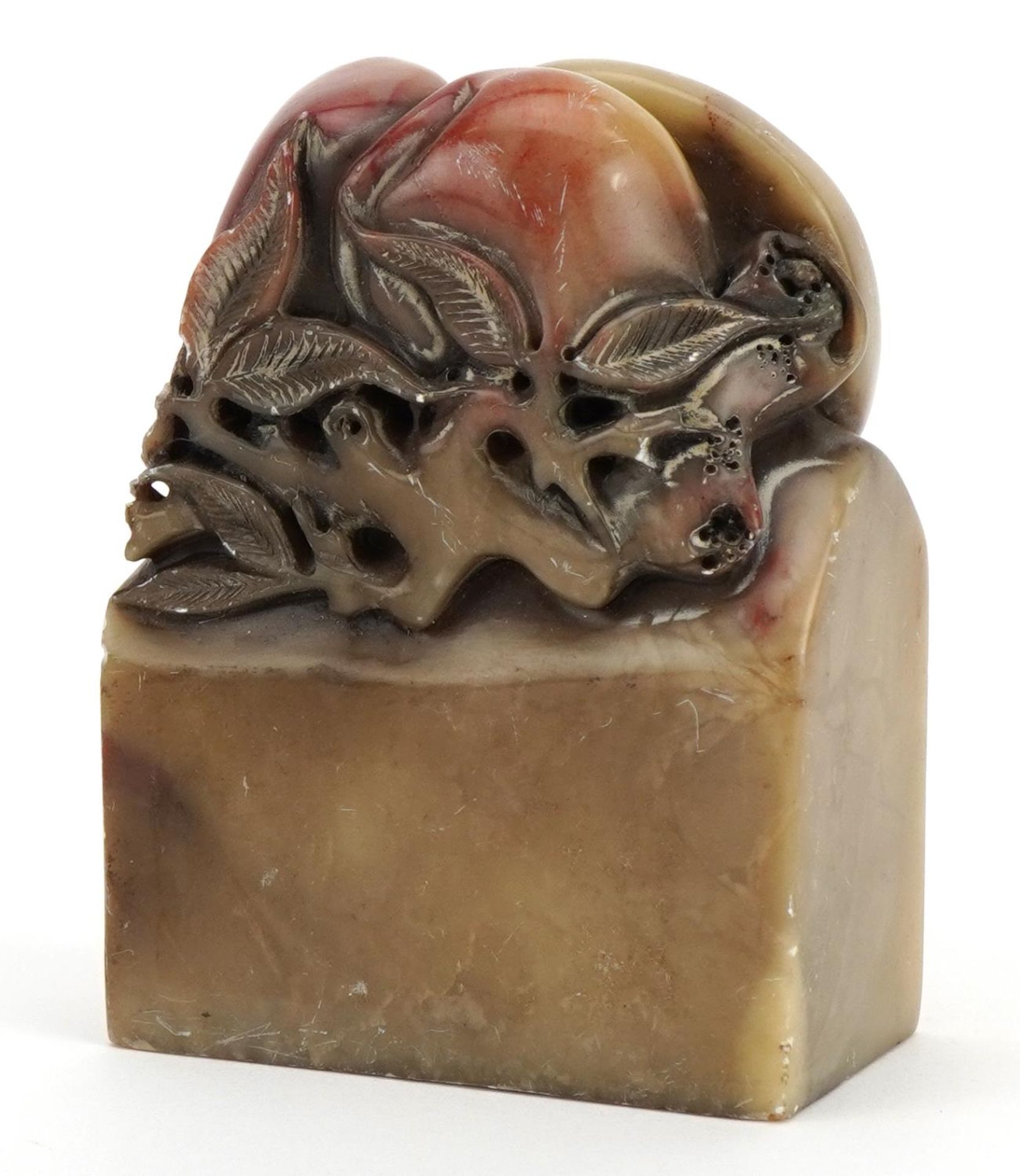 Chinese soapstone seal carved with flowers and fruit, six figure character marks to the base, 7cm