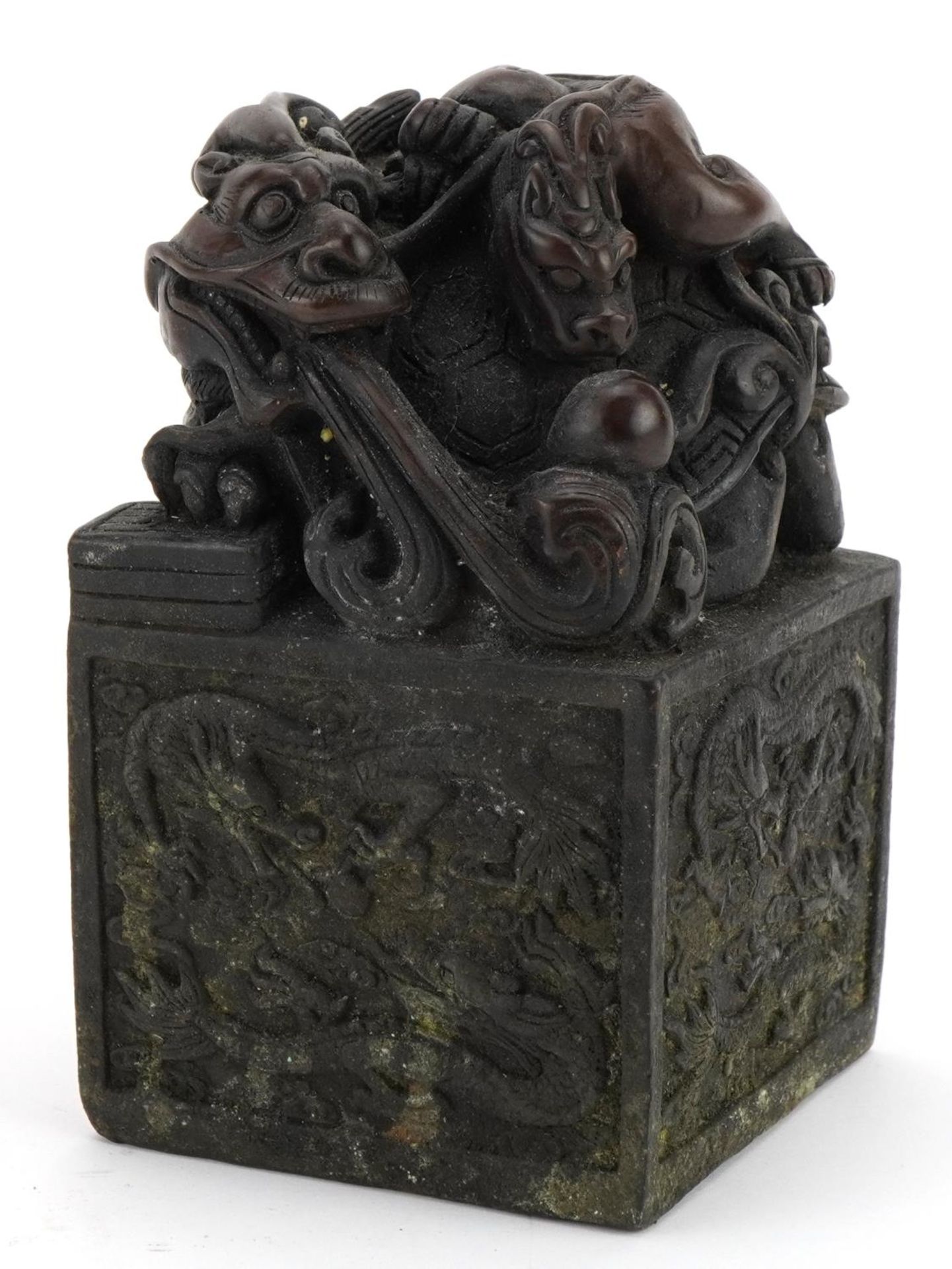 Large Chinese patinated bronze seal decorated with dragons, six figure character marks to the