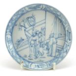 Chinese blue and white porcelain dish hand painted with figures in a palace setting within a