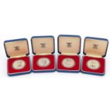 Four Queen's Silver Jubilee silver proof coins with fitted cases