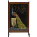 Mahogany and tapestry fire screen depicting a peacock, 100cm high x 59cm wide