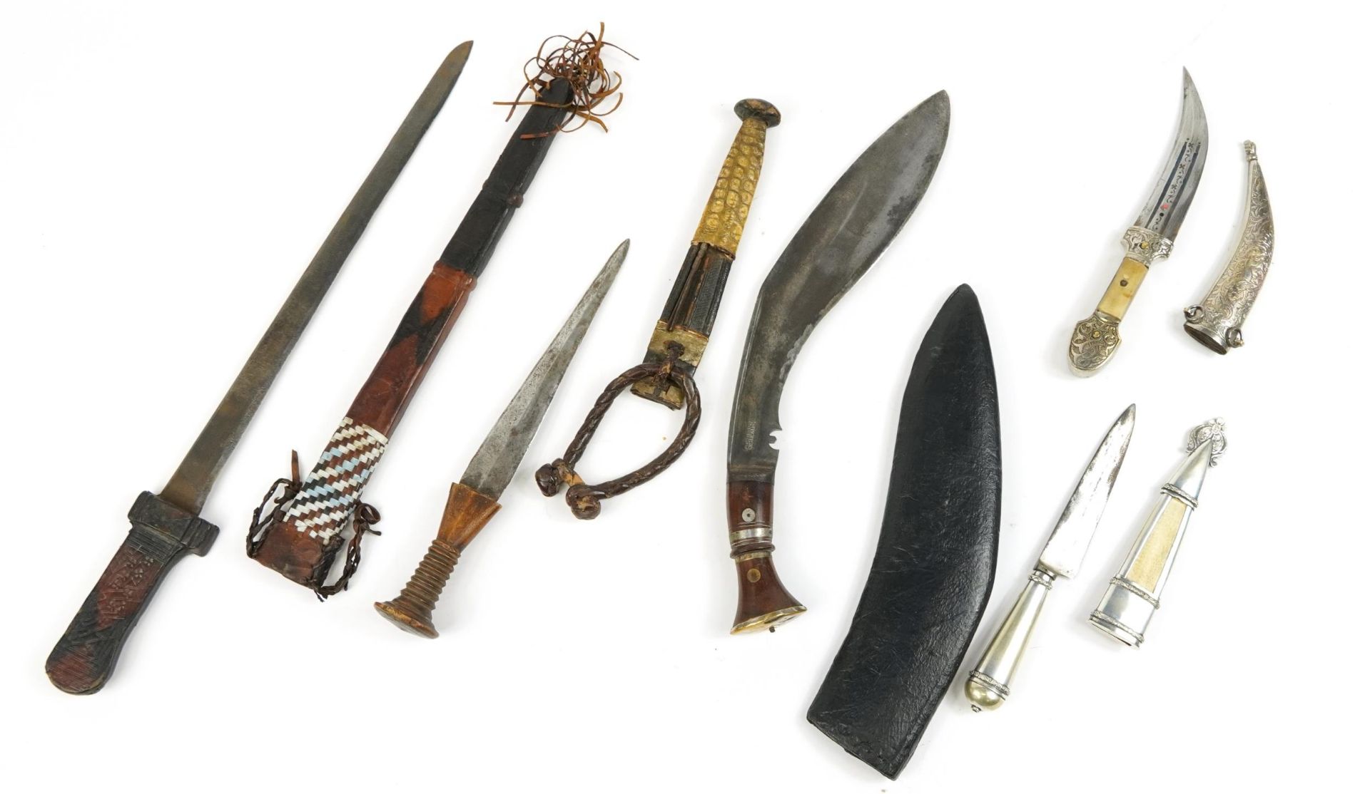 Five Middle Eastern knives and daggers with sheaths including one with crocodile skin sheath, one - Image 2 of 3