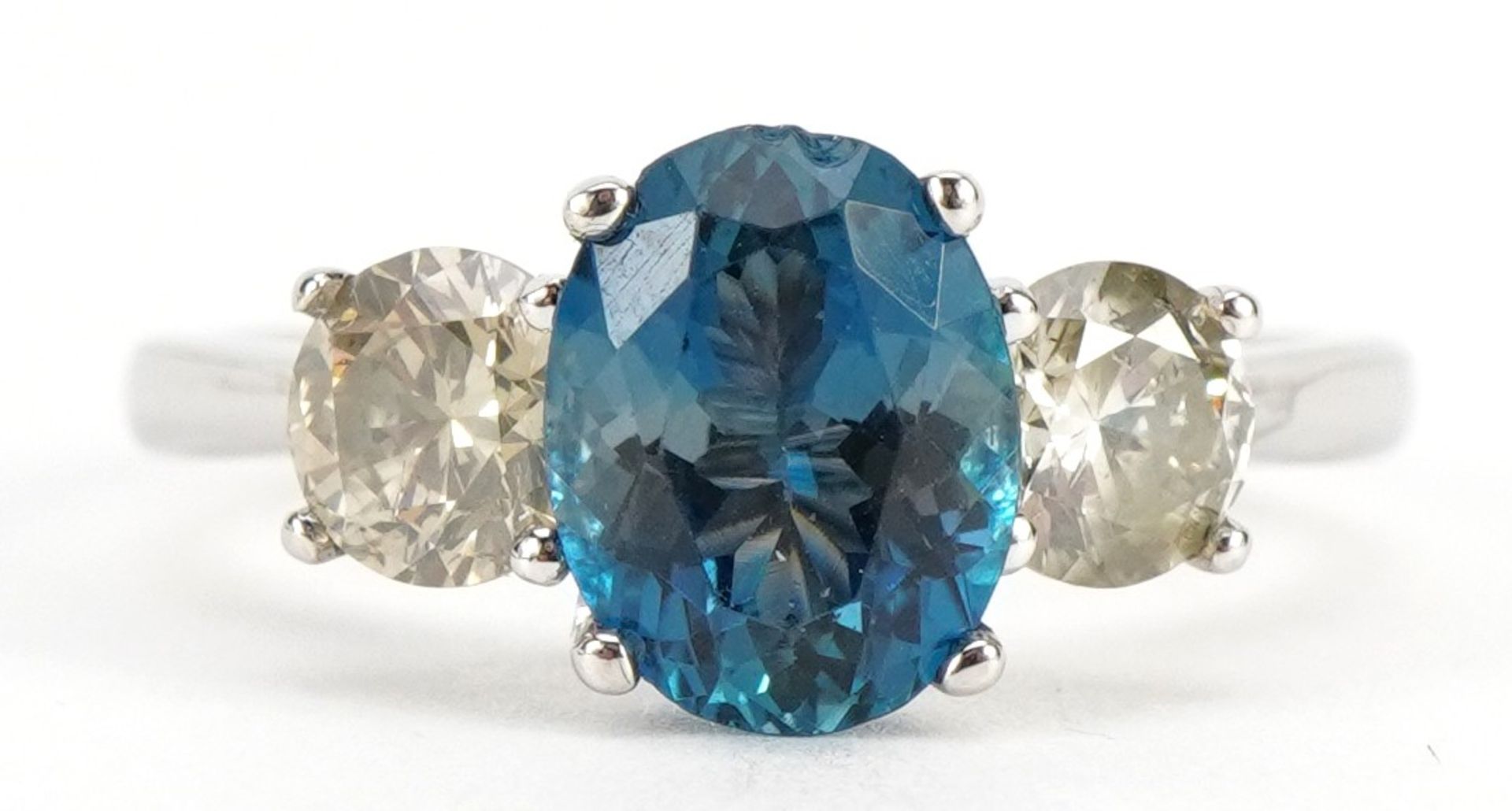 18ct white gold topaz and diamond trilogy ring, total topaz weight approximately 1.95 carat, total