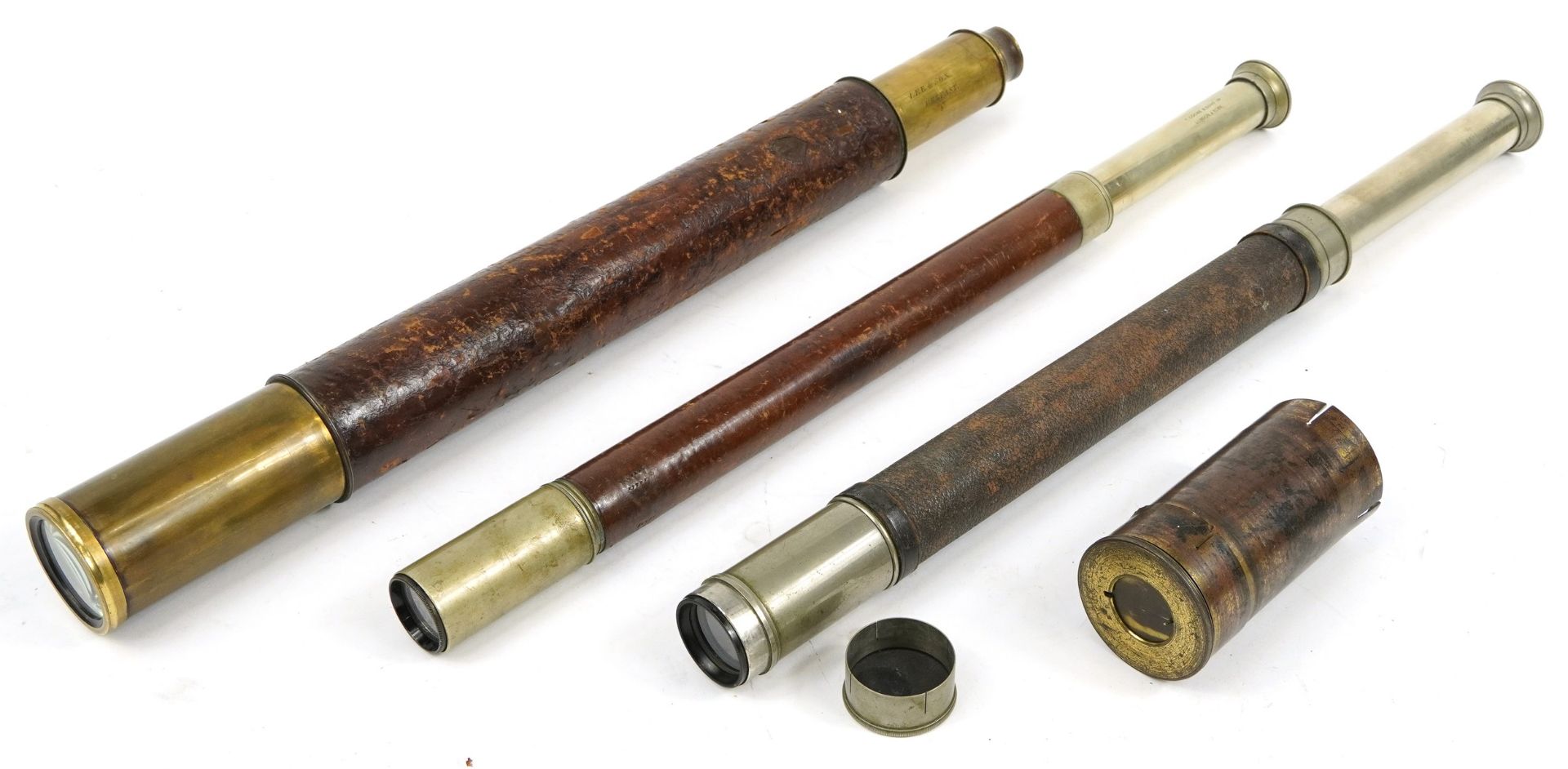 Three 19th century and later leather bound single draw telescopes comprising Lee & Son of Belfast, T