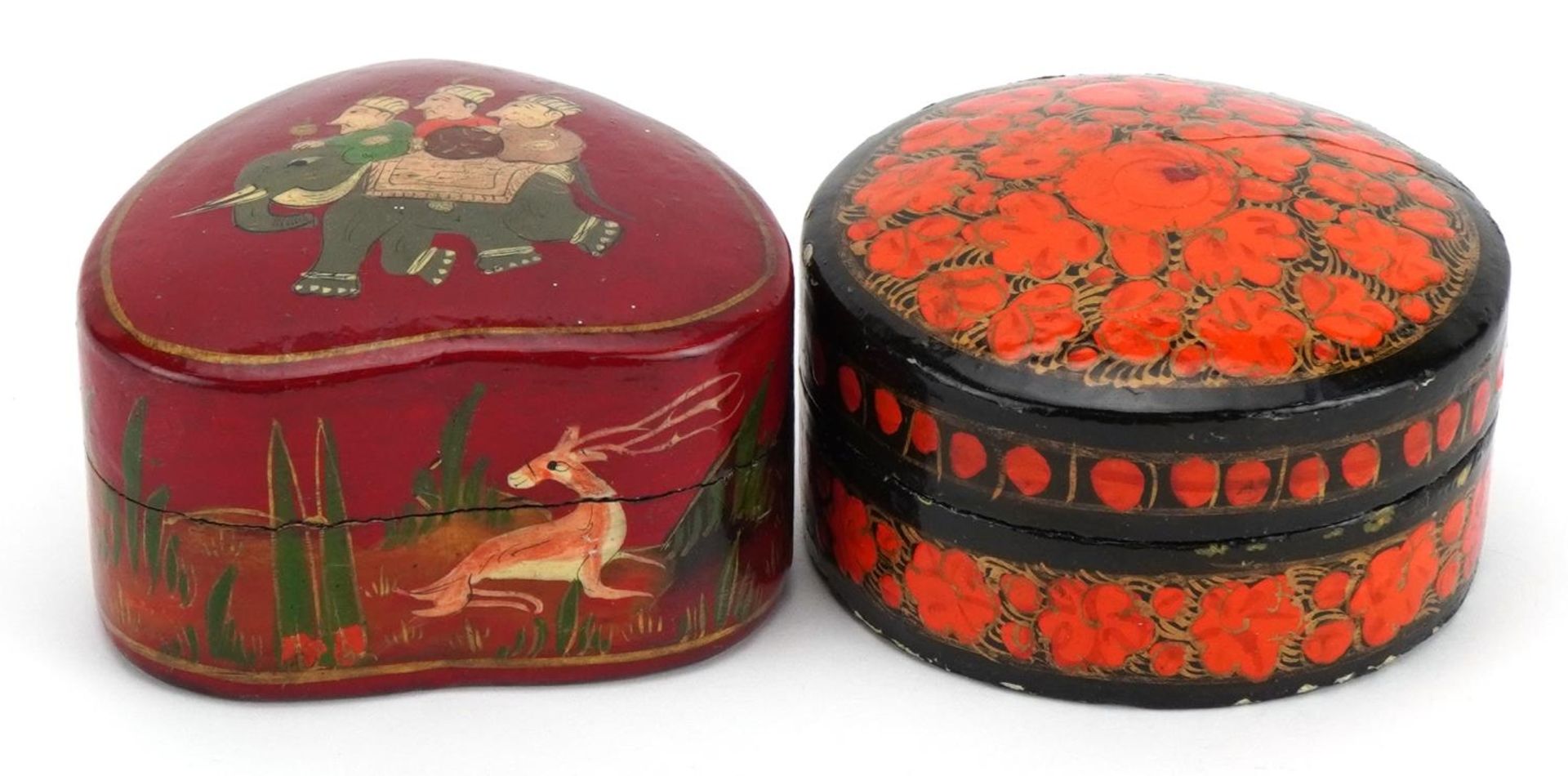 Two Indian lacquered boxes and covers including one hand painted with an elephant and consort, the