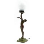 Art Deco patinated spelter semi nude female table lamp with a globular glass shade