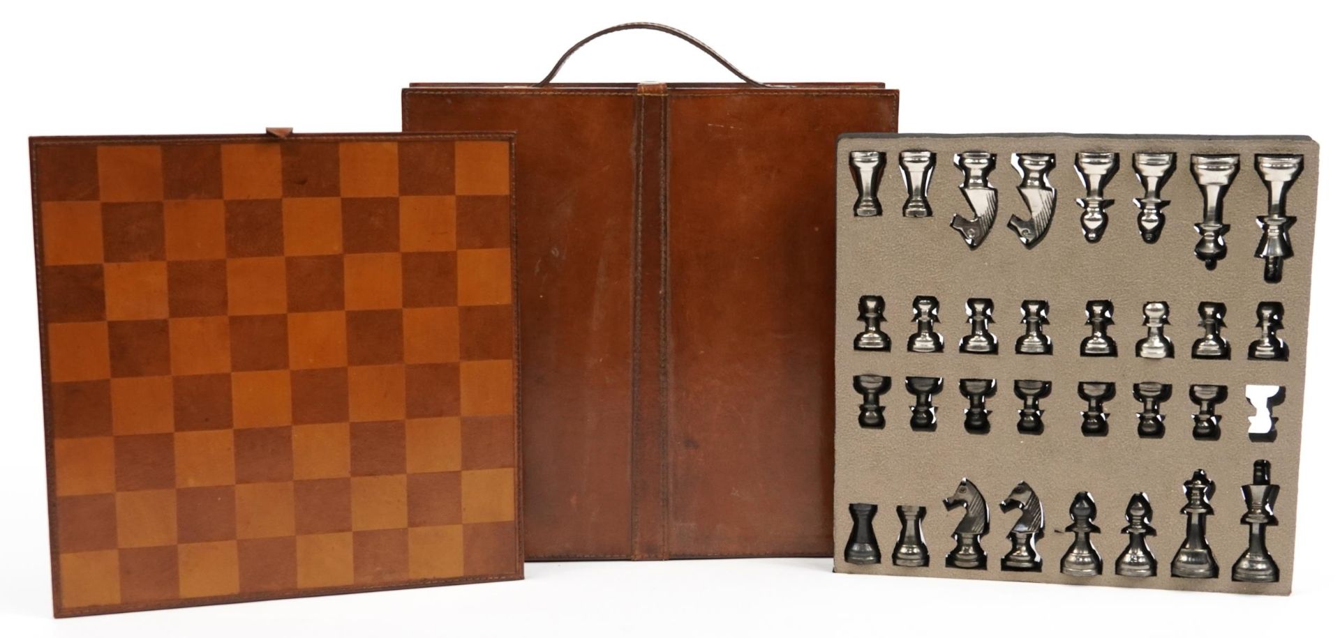 Tan leather cased travelling chess set with cast metal pieces, the largest piece 8cm high - Image 2 of 7