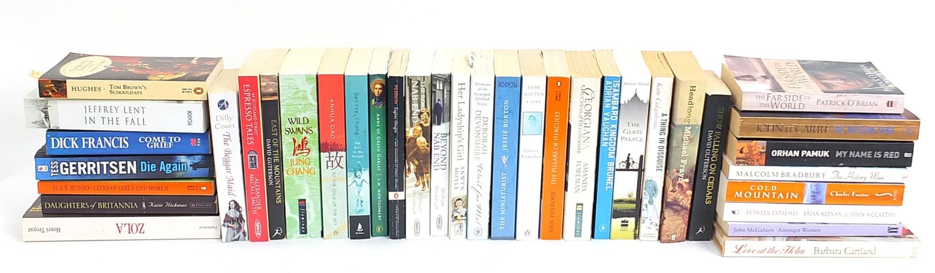 Assorted paperback novels including Jane Austen, Dick Franis, Amitav Ghosh The Glass Palace and John