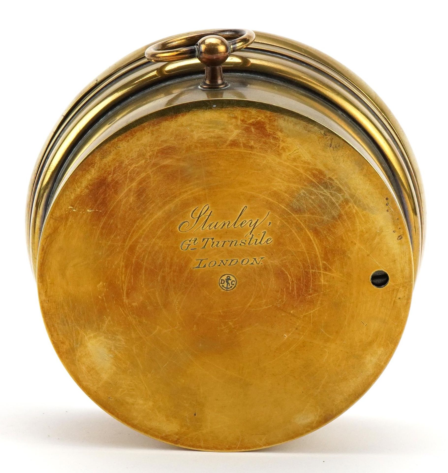 Brass cased aneroid hanging barometer engraved Stanley London to the reverse, 12.5cm in diameter - Image 2 of 4