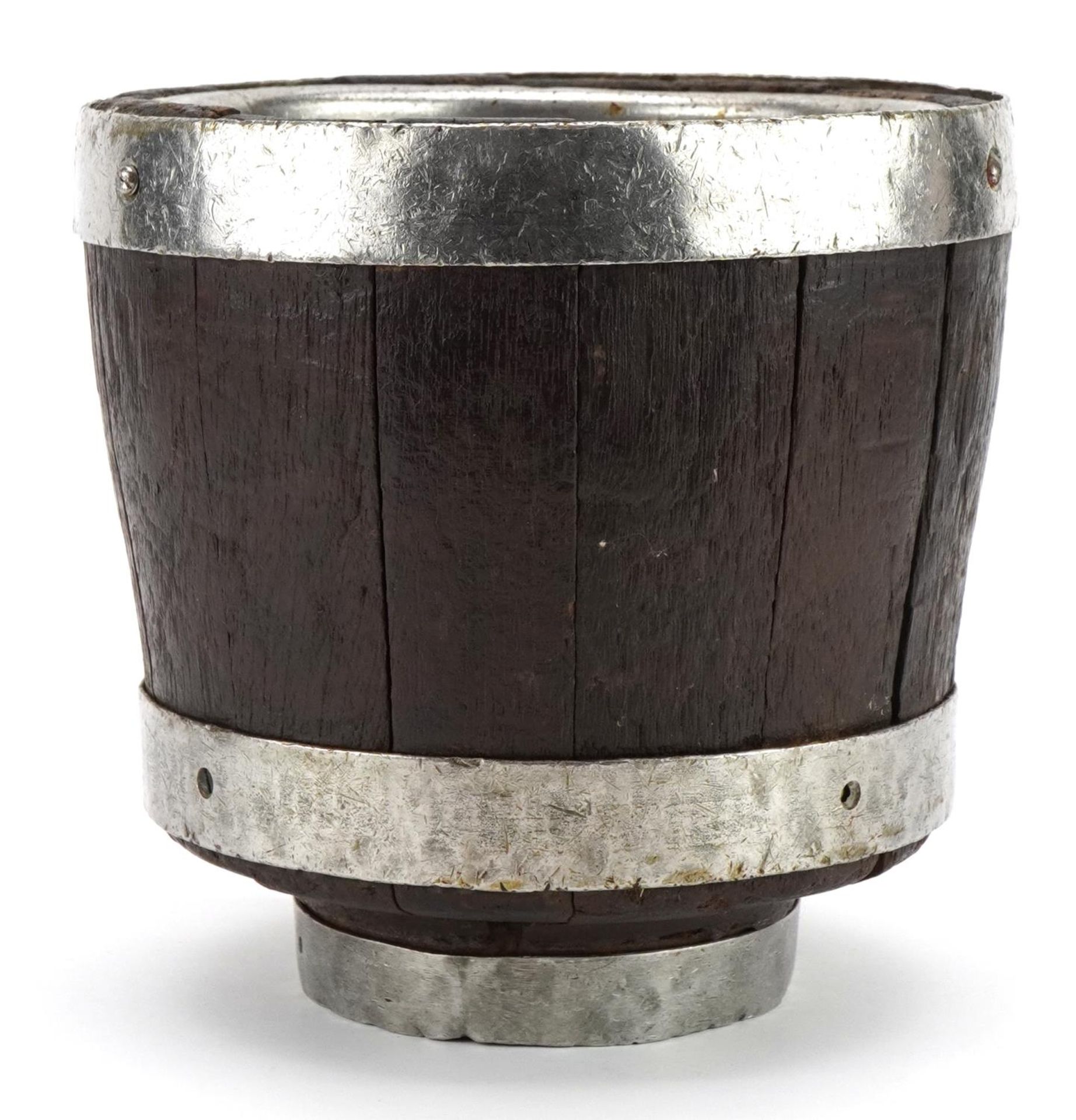 Antique oak and coconut metal bound barrel planter, 19cm high x 19cm in diameter