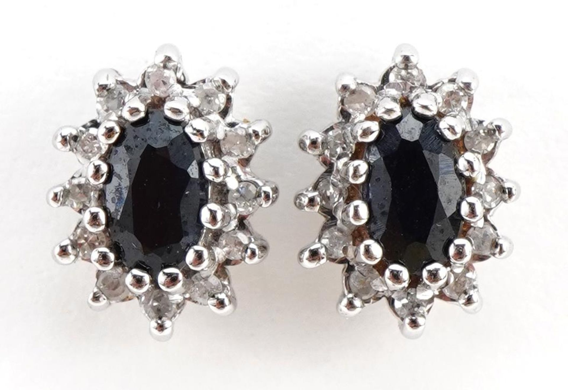 Pair of 9ct gold sapphire and diamond cluster stud earrings, 9mm high, 1.8g