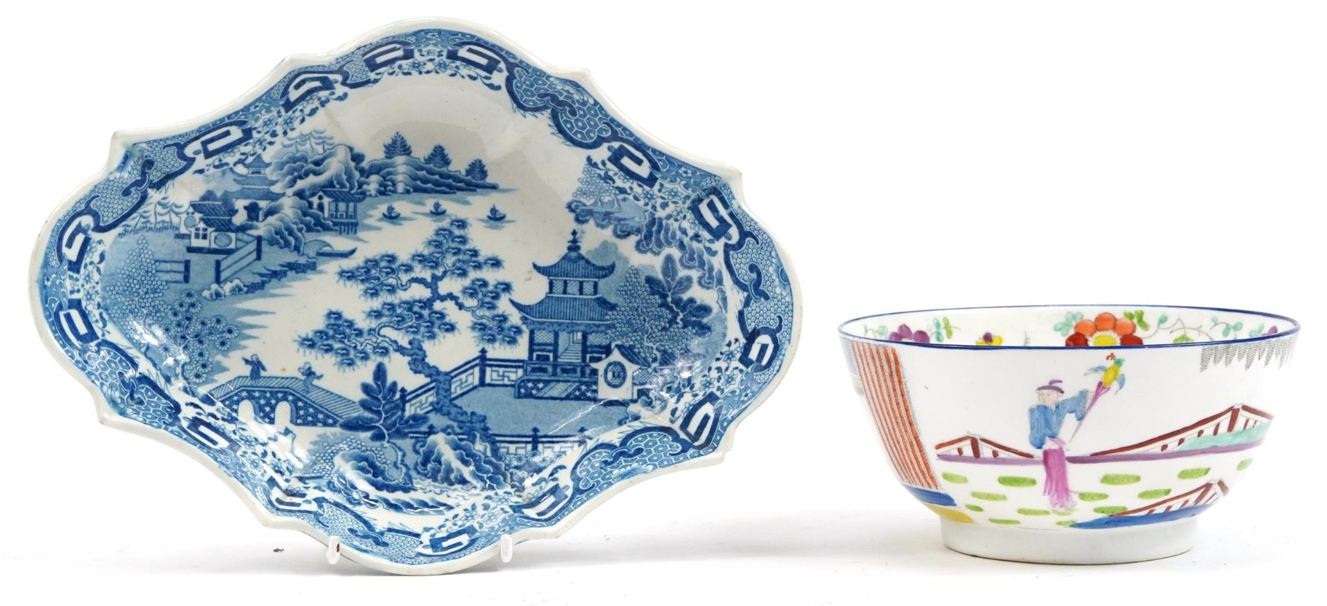 19th century blue and white pottery dish printed in the chinoiserie manner and a hand painted