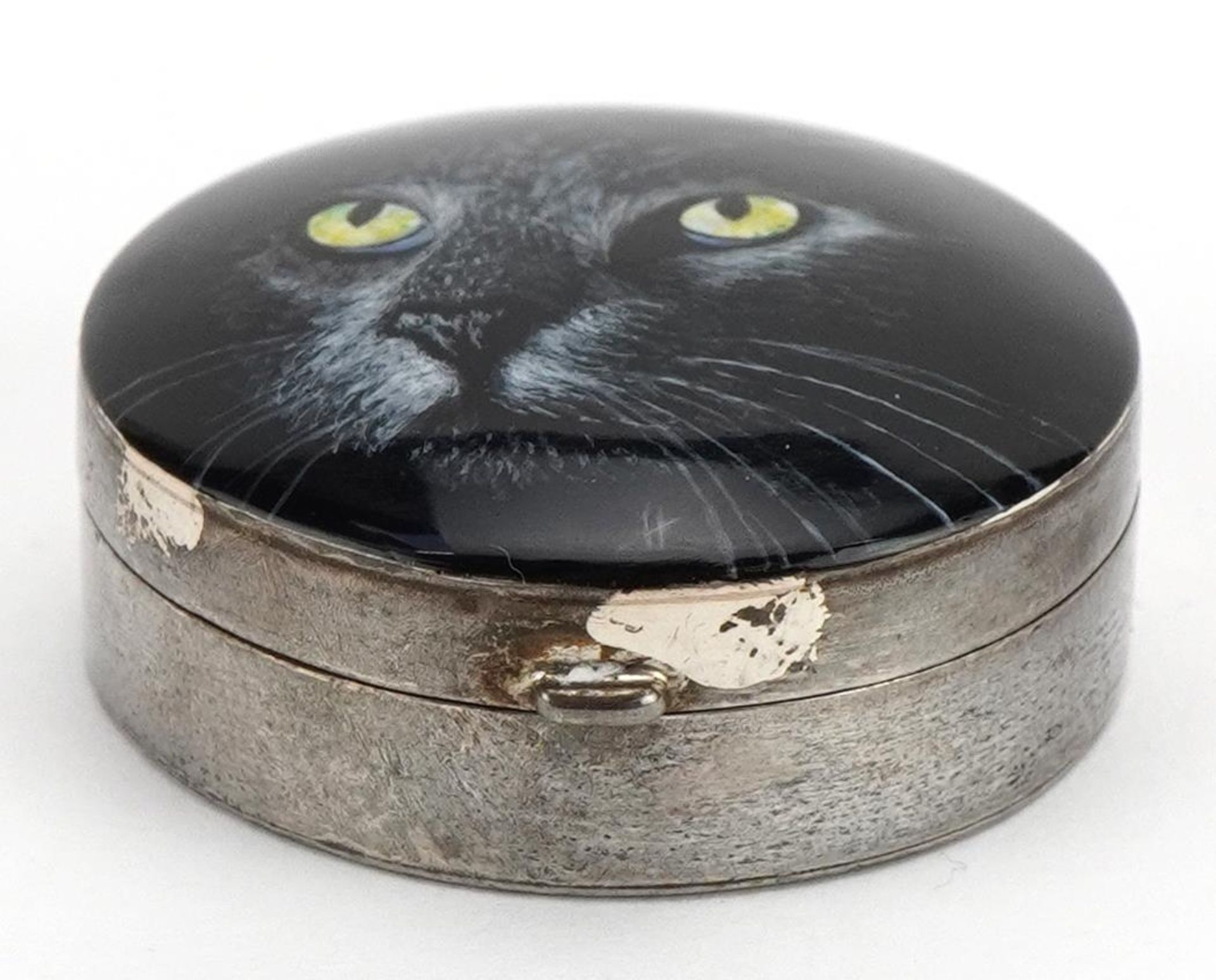 Circular silver and enamel pillbox with hinged lid decorated with a black cat, housed in a GH - Image 2 of 6