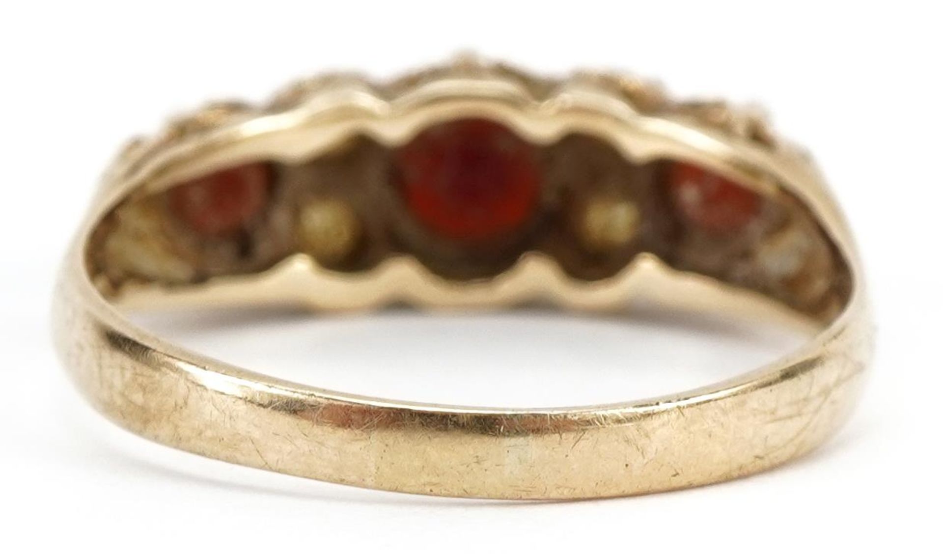 Victorian style 9ct gold garnet and clear stone ring, the central garnet approximately 5.0mm in - Image 2 of 4