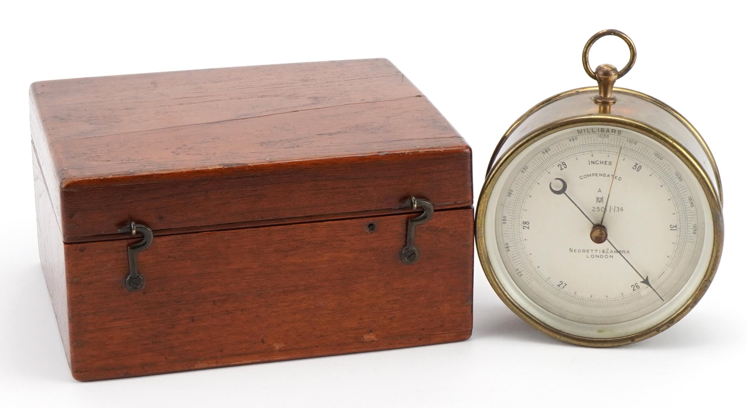 Negretti & Zambra of London, brass cased wall hanging compensated barometer housed in an oak case - Image 4 of 7