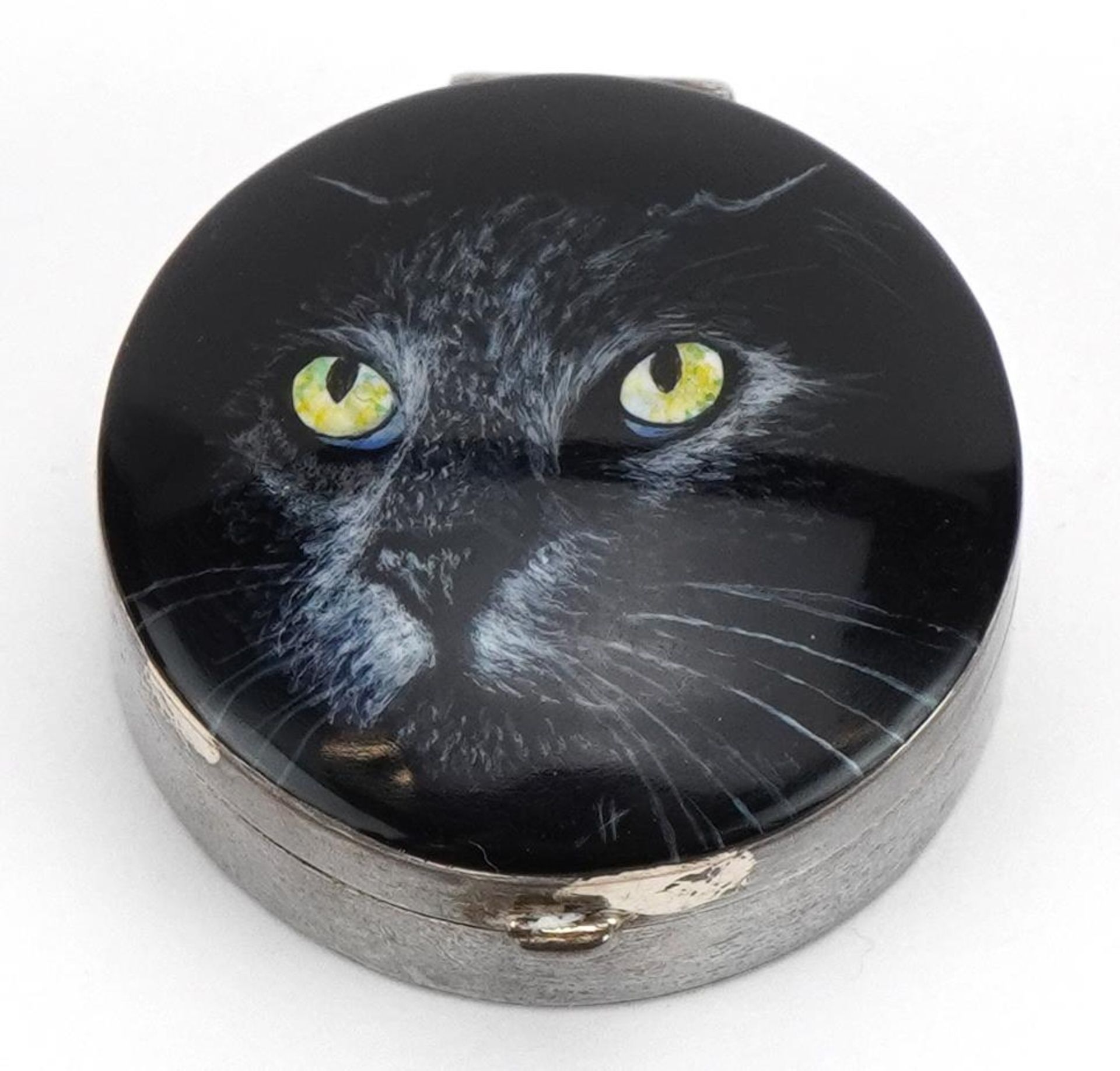 Circular silver and enamel pillbox with hinged lid decorated with a black cat, housed in a GH - Image 3 of 6