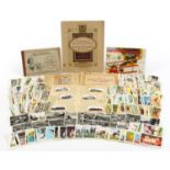 Collection of cigarette and tea cards, some arranged in albums including Brooke Bond, Wills and John