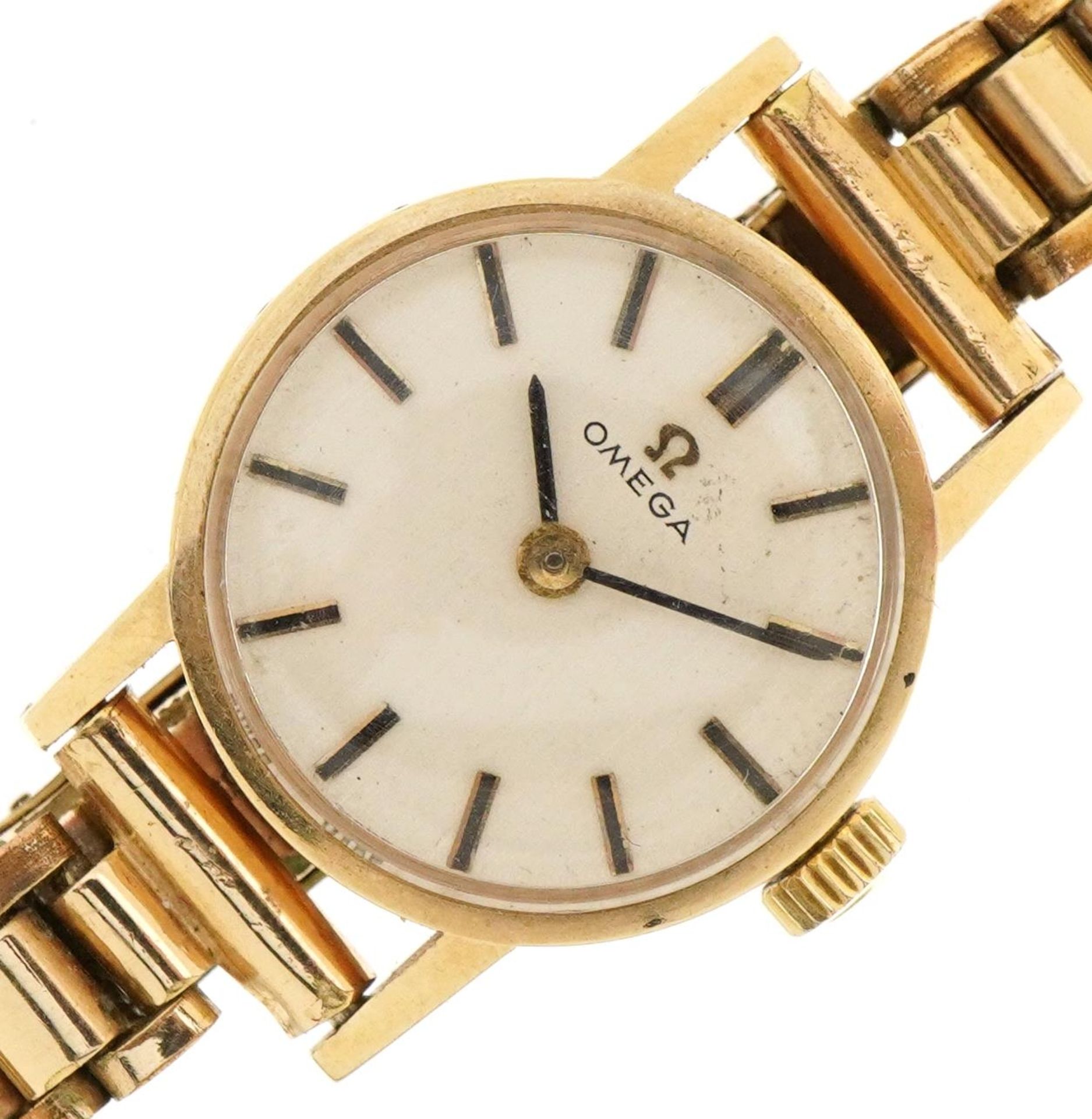 Omega, ladies 9ct gold wristwatch with strap, patent number 670799, the case 19mm in diameter, total