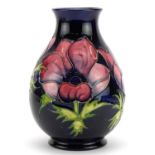 Moorcroft Pottery baluster vase hand painted with flowers hand painted with flowers, 19.5cm high