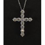 Large 18ct white gold diamond cross pendant on an 18ct white gold necklace, total diamond weight