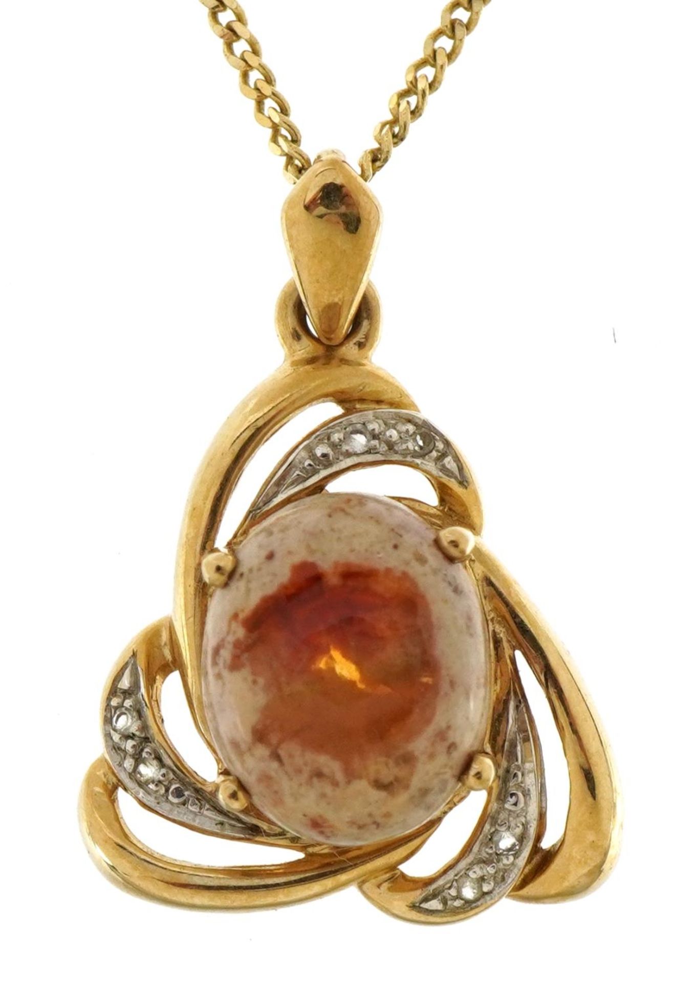 9ct two tone gold cabochon orange stone pendant set with clear stones on a 9ct gold curb link