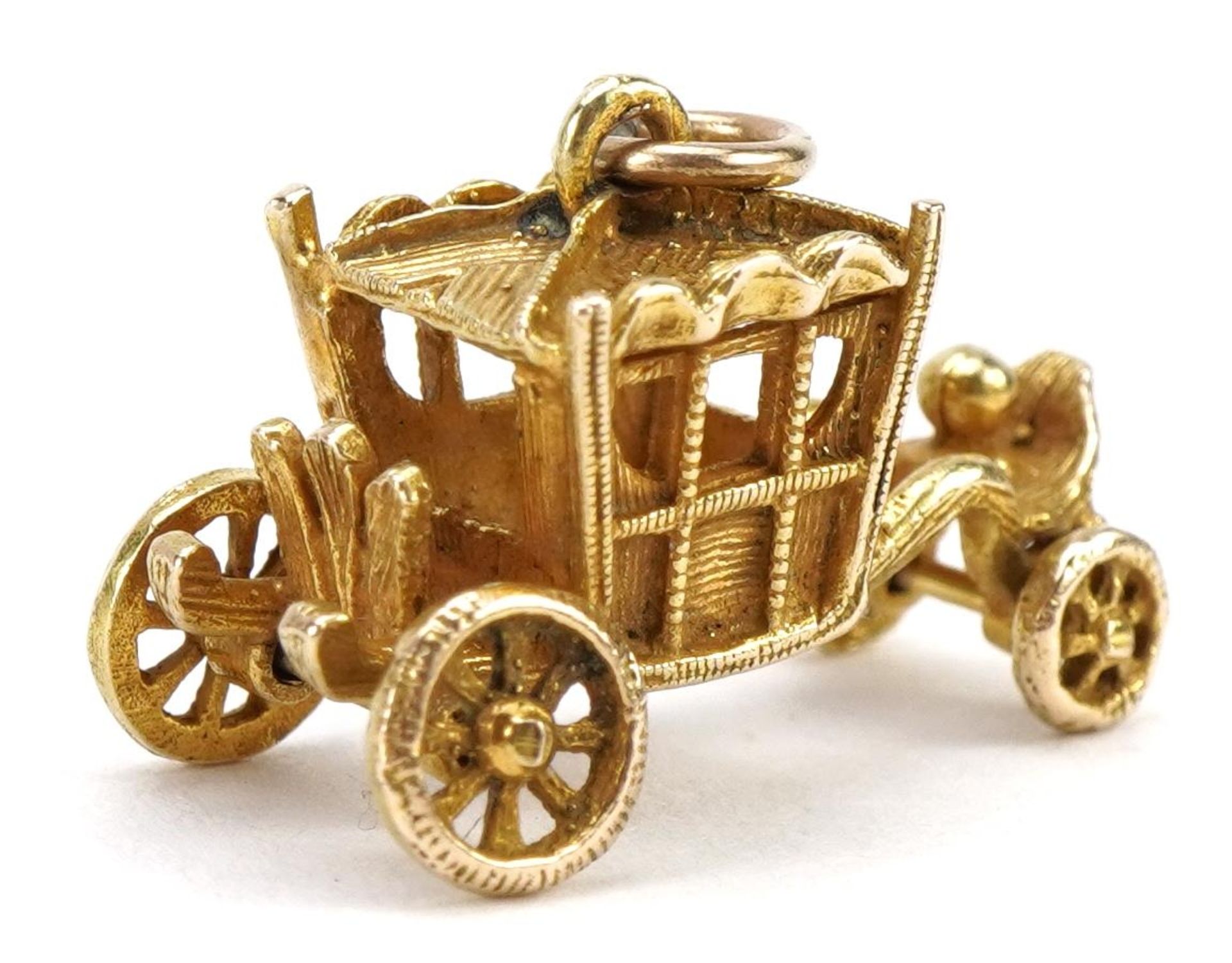 9ct gold carriage charm with rotating wheels, 2.2cm wide, 3.0g - Bild 2 aus 2