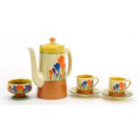 Clarice Cliff, Art Deco Crocus pattern part coffee service comprising coffee pot, two coffee cans