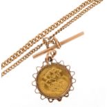 George V 1914 gold half sovereign in pendant mount on 9ct watch chain with T bar and two jewellery