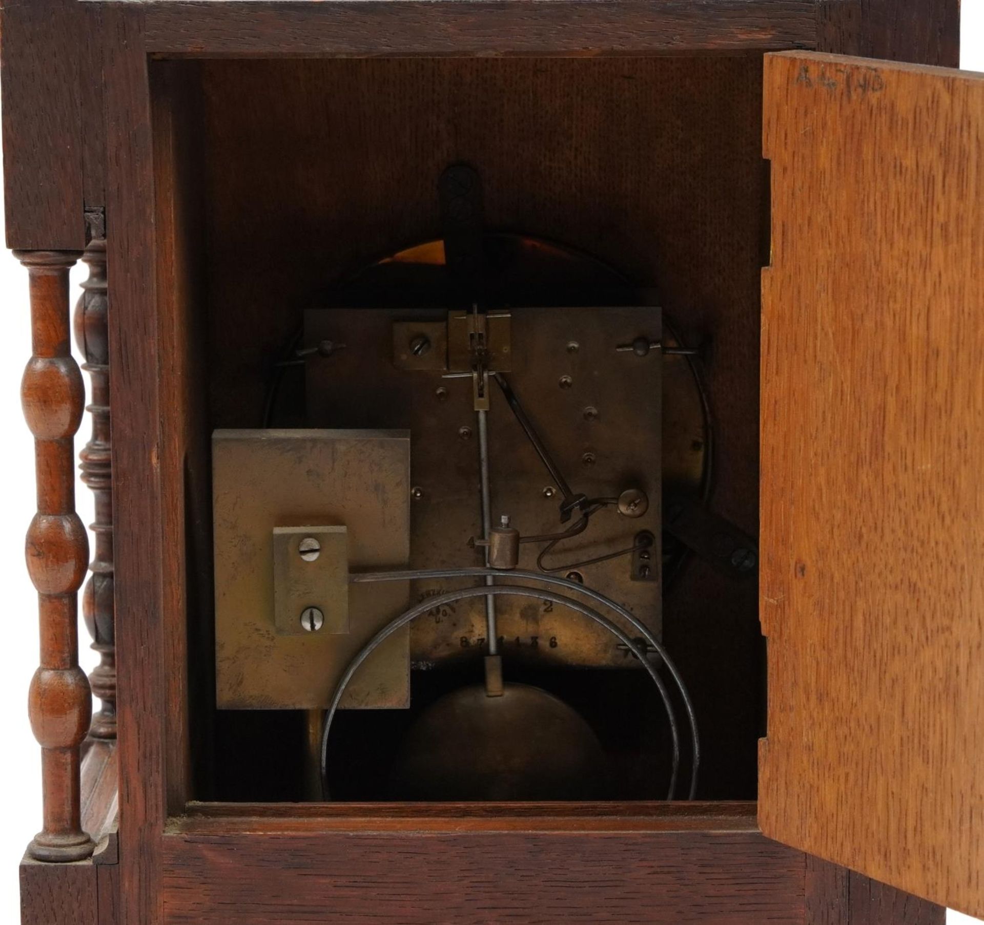 Gothic style carved walnut striking mantle clock with silvered dial having Roman numerals, 35cm high - Bild 3 aus 3
