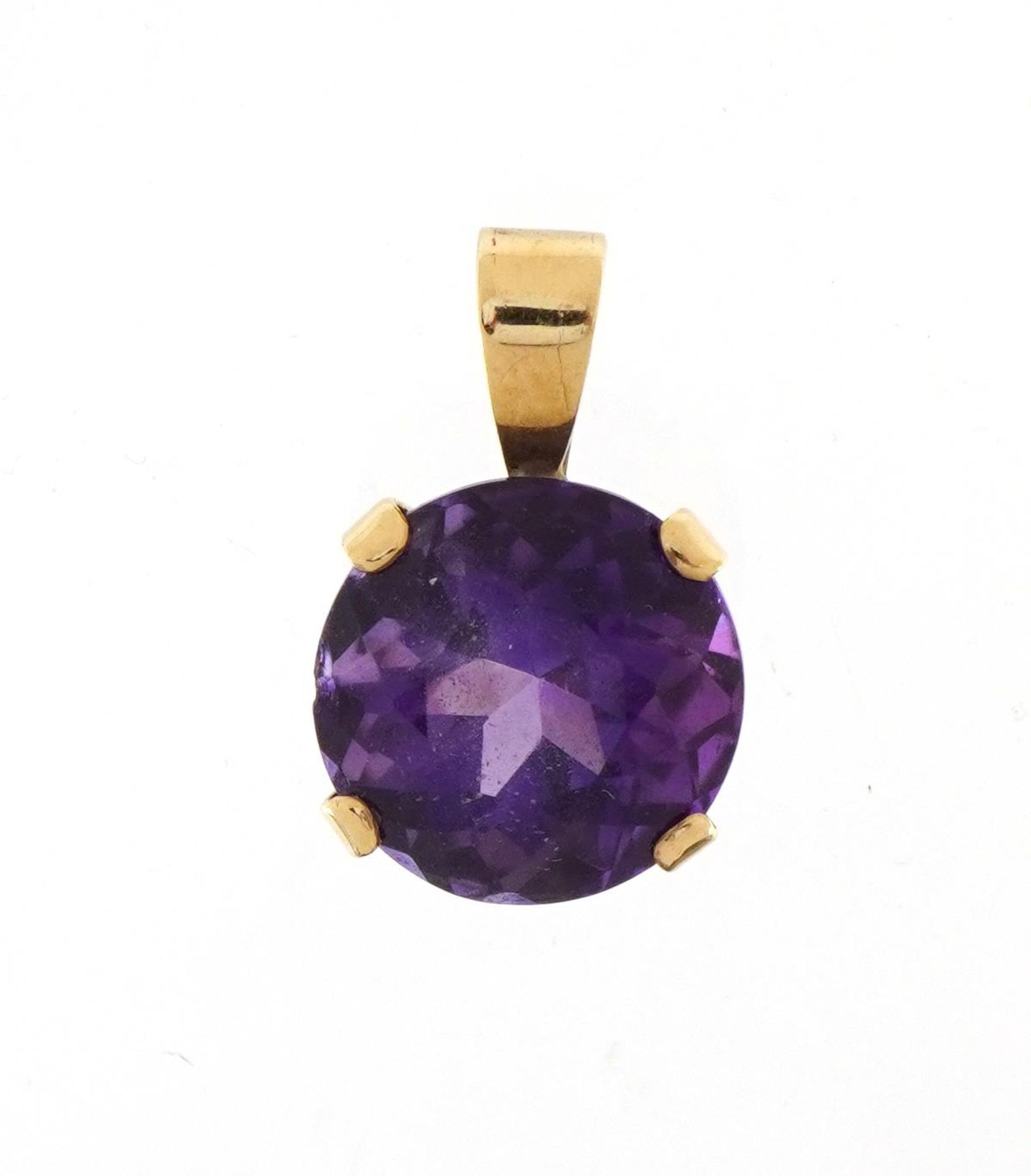 9ct gold purple stone solitaire pendant, possibly amethyst, 1.9cm high, 2.6g