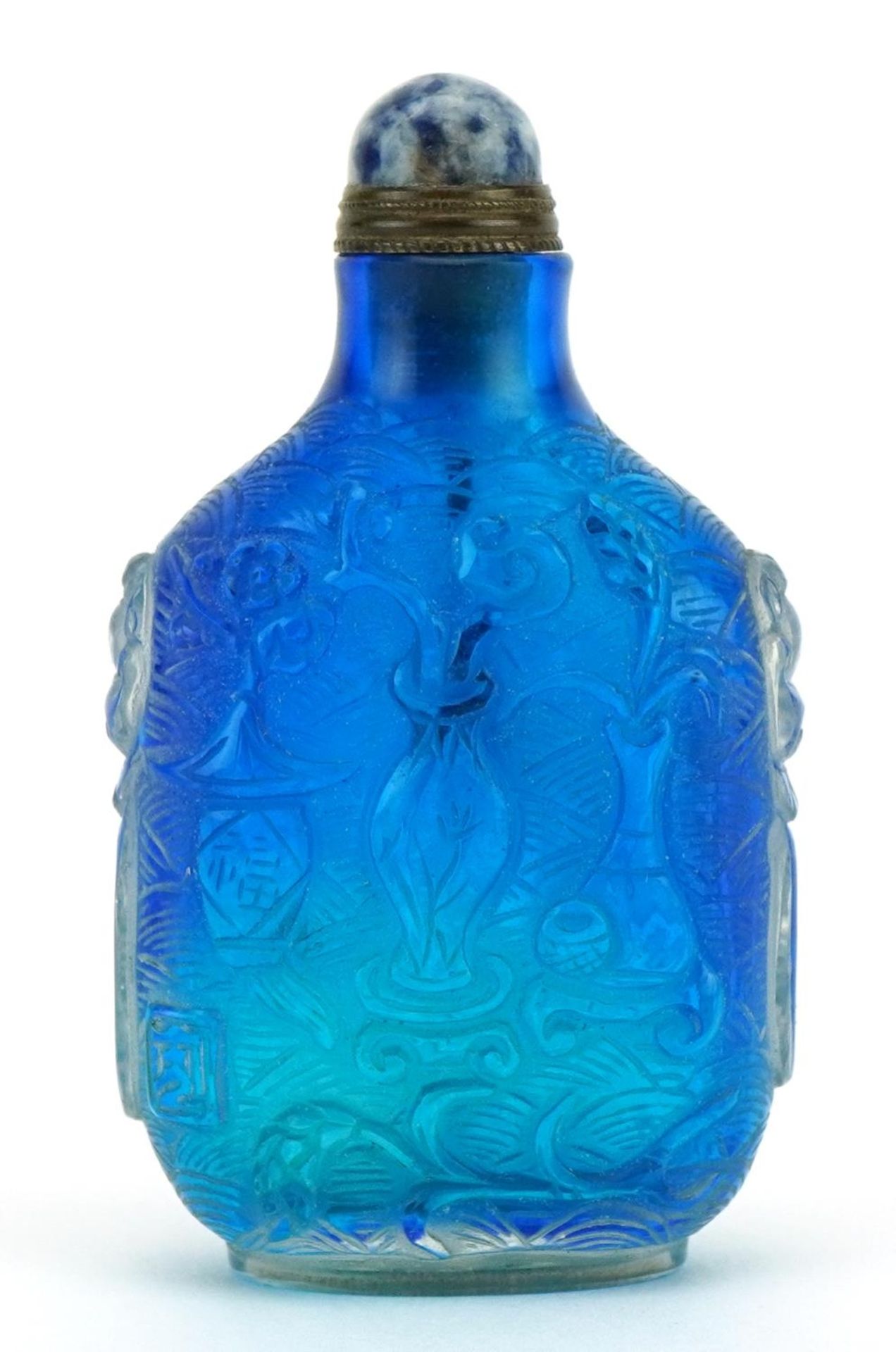 Chinese blue glass snuff bottle decorated in relief with lucky objects, 7.5cm high