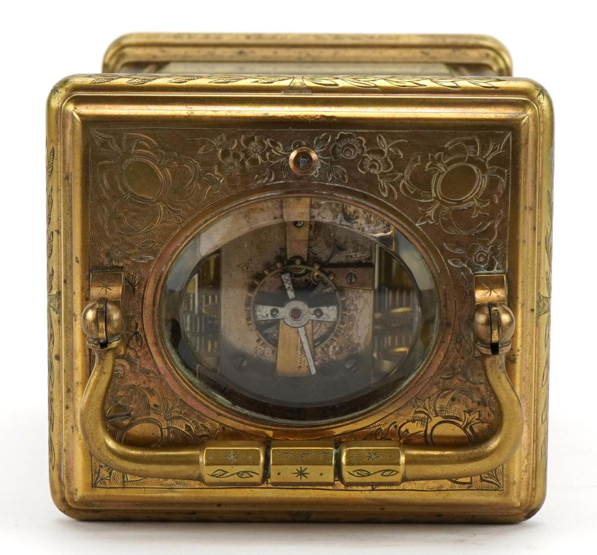 Large brass cased repeating carriage alarm clock engraved with flowers, the enamelled dial with - Image 4 of 5