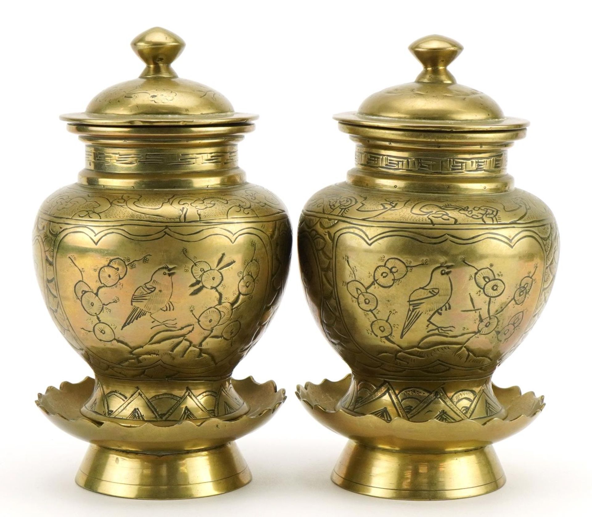 Pair of Chinese bronze vases and covers with stands and engraved with birds amongst cherry