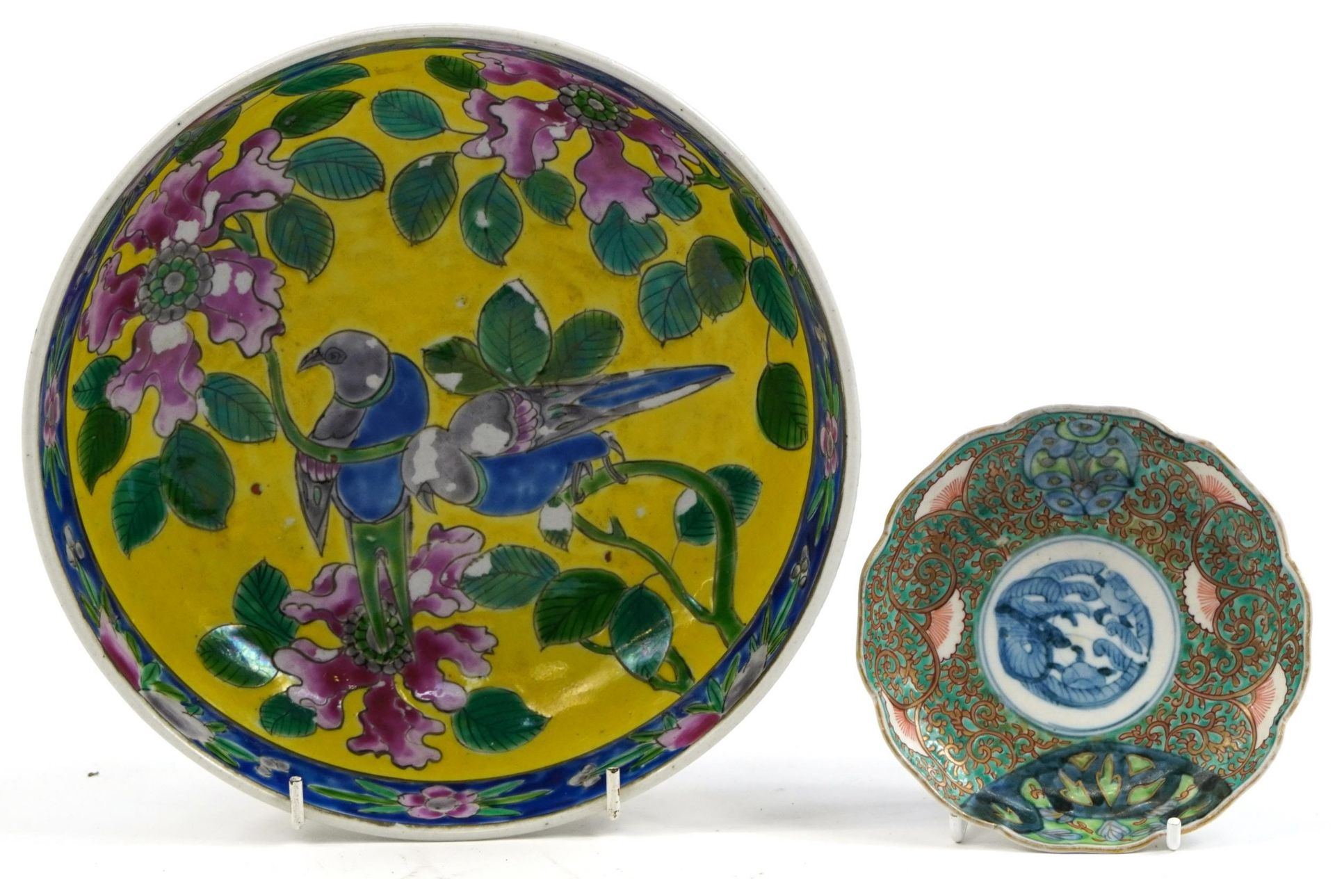 Japanese Imari footed dish hand painted with flowers and a bowl hand painted with a bird amongst