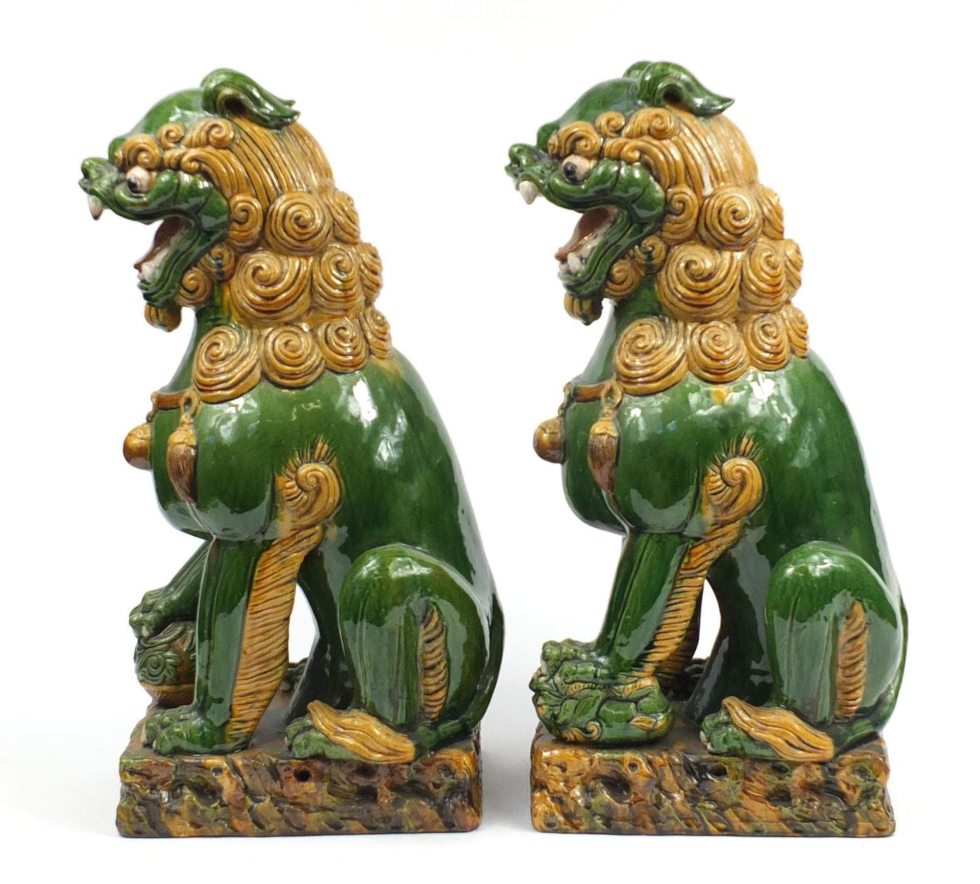 Large pair of Chinese floor standing pottery seated lions having a sancai type glaze, each 59cm high - Image 3 of 7