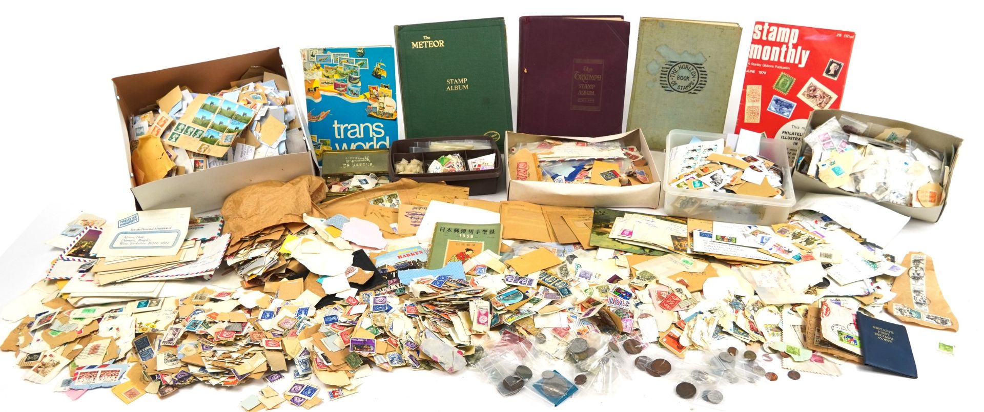 Extensive collection of world stamps arranged in albums, on envelopes and loose