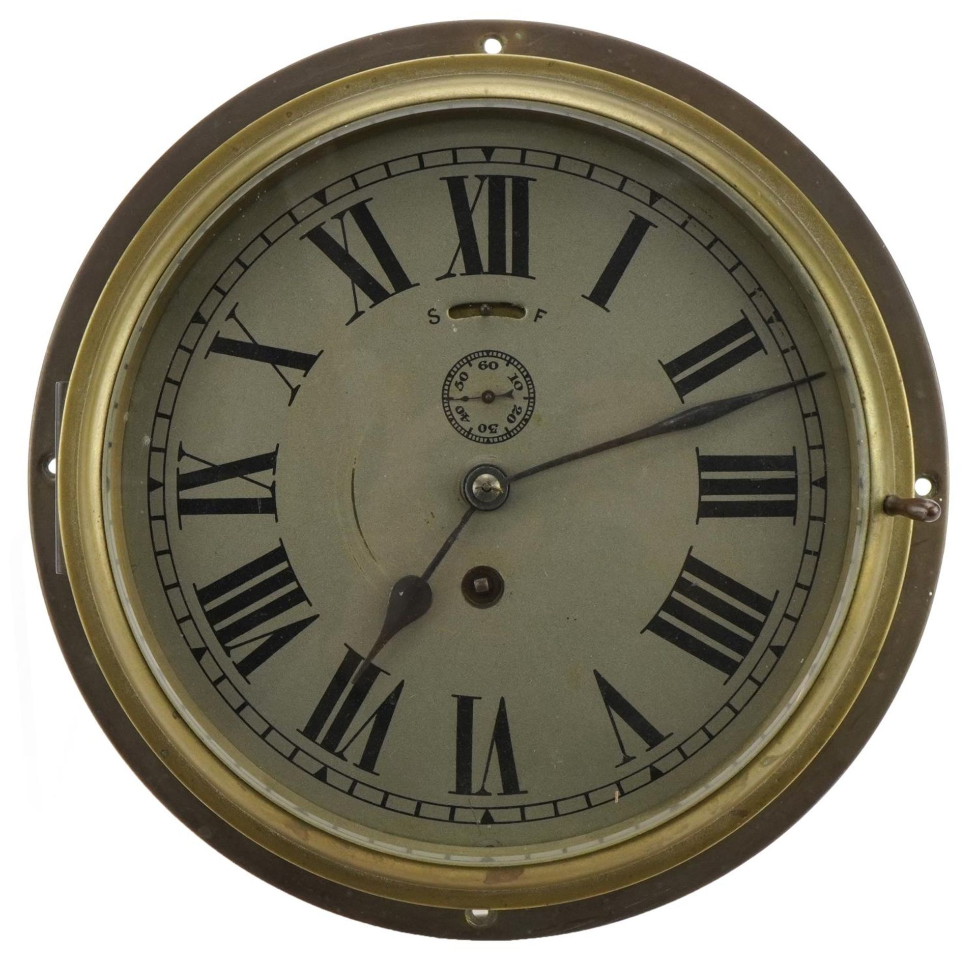 Brass cased ship's design bulkhead clock with Roman numerals, 25cm in diameter,