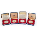 Four Queen's Silver Jubilee silver proof coins with fitted cases