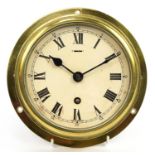 Elliott, brass ship's bulkhead clock, the dial with Arabic numerals, 21cm in diameter