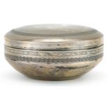 Circular Egyptian silver box and cover, 12cm in diameter, 236.8g